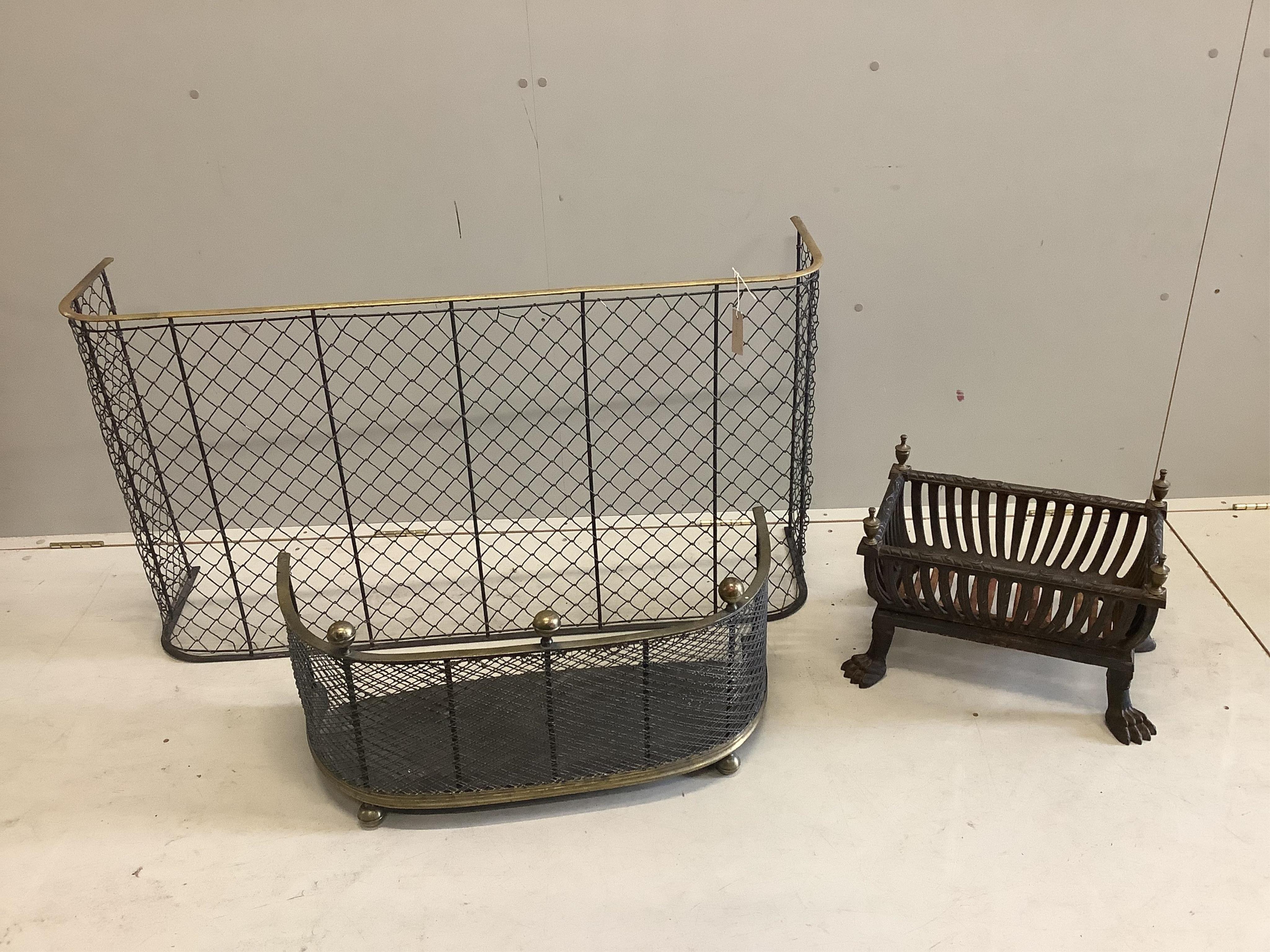 Two fireguards and a fire basket, largest fireguard, width 121cm, depth 31cm, height 66cm, inside measurement 108cm